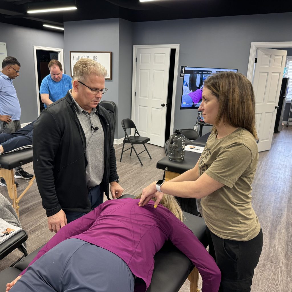 instructor demonstrating advanced anatomy techniques